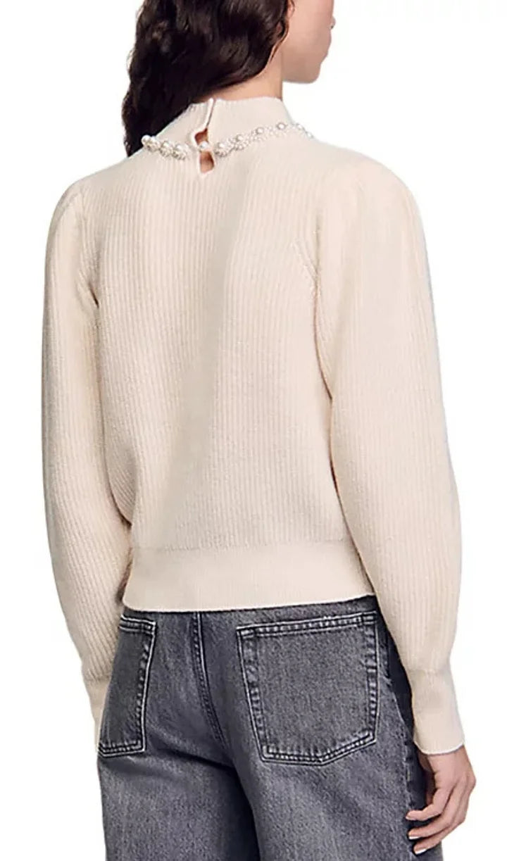 Maglione a collo alto con perline e blocchi di colore