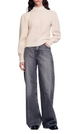 Maglione a collo alto con perline e blocchi di colore